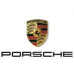 Das Porsche-Logo mit einem gold-rot-schwarzen Wappen symbolisiert Wirtschaftskooperationen und Innovation.