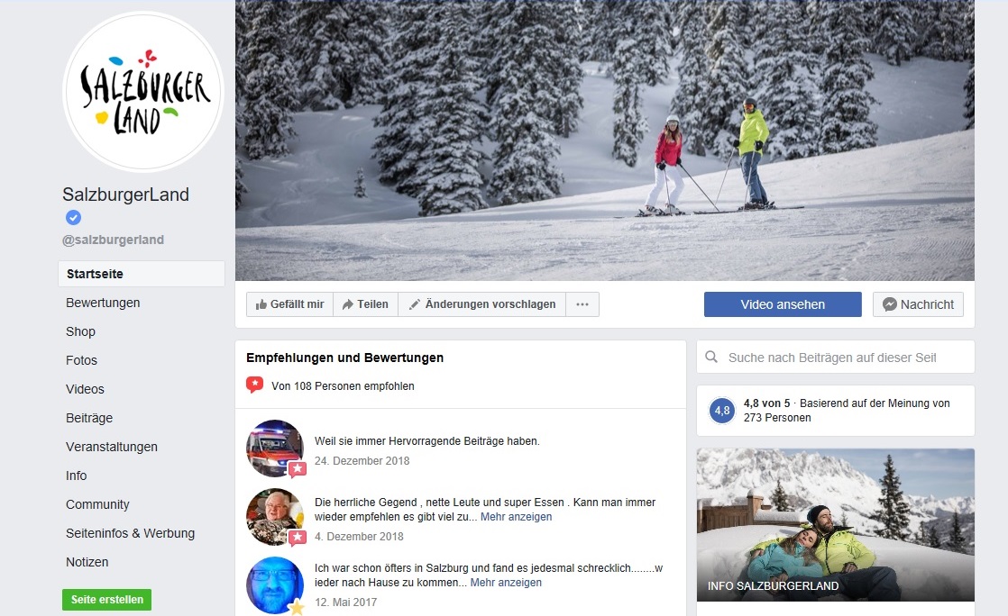 Zwei Personen fahren Ski auf einer verschneiten Piste mit Bäumen im Hintergrund; SalzburgerLand Facebook Seite angezeigt.