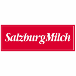 Rotes Rechteck mit SalzburgMilch in weißer Kursivschrift, zentriert auf weiß, symbolisiert Wirtschaftskooperationen.